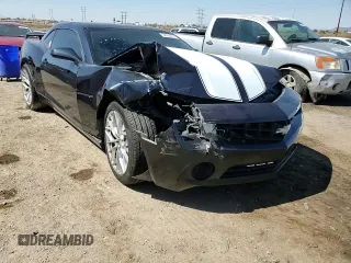 2013 Chevrolet Camaro LS z VIN 2G1FA1E37D9166438, wystawiony jako Copart lot #54959315 z przebiegiem 140 248 mil mil oraz Szkoda całkowita • Salvage title. Historia ofert i sprzedaży dostępna na DreamBid. Obrazek 13.