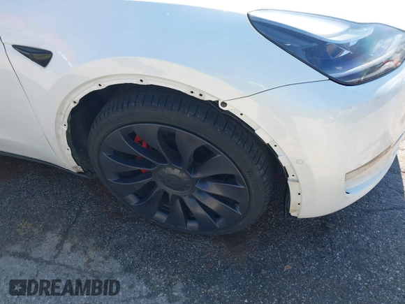 2021 Tesla Model Y Performance with VIN 5YJYGDEF8MF246658, listed as a IAAI auction lot 41679793 with 28,015 mi miles and . Bid and sale history available at DreamBid. Image 19.