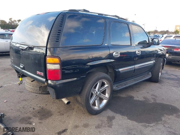 2004 GMC Yukon SLT with VIN 1GKEC13T54R166769, listed as a IAAI auction lot 41734213 with 188857 miles. Bid and sale history available at carsss.com. Image 4.
