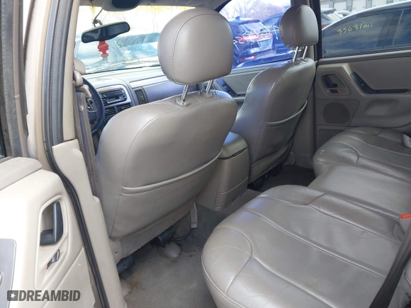 2001 Jeep Grand Cherokee Laredo with VIN 1J4GW48S21C572272, listed as a IAAI auction lot 41695754 with 169,229 mi miles. Bid and sale history available at carsss.com. Image 8.