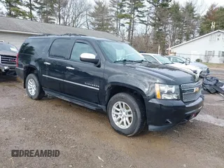 2014 Chevrolet Suburban LTZ with VIN 1GNSKKE73ER141451, listed as a IAAI auction lot 41479463 with 127,876 mi miles and . Bid and sale history available at DreamBid. Image 1.