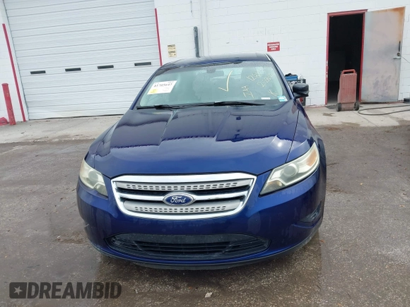 2011 Ford Taurus SE with VIN 1FAHP2DW7BG128857, listed as a IAAI auction lot 41705643 with 163,589 mi miles. Bid and sale history available at carsss.com. Image 6.