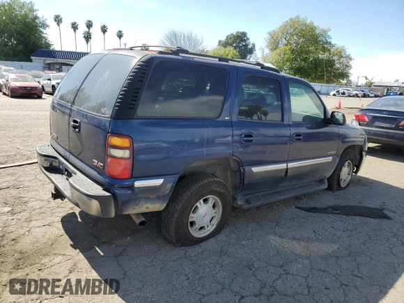 2001 GMC Yukon SLT z VIN 1GKEC13T21J264040, wystawiony jako Copart lot #46282145 z przebiegiem 136 264 mil mil oraz Szkoda całkowita • Salvage title. Historia ofert i sprzedaży dostępna na DreamBid. Obrazek 3.