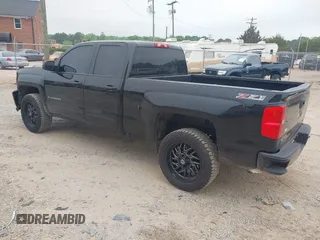 2016 Chevrolet Silverado 1500 LT with VIN 1GCVKREC4GZ113687, listed as a IAAI auction lot 42107434 with 95,577 mi miles and . Bid and sale history available at DreamBid. Image 3.