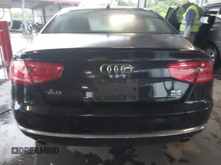 2012 Audi A8 with VIN WAUAVAFD9CN006499, listed as a IAAI auction lot 42461402 with 57,232 mi miles and . Bid and sale history available at DreamBid. Image 16.