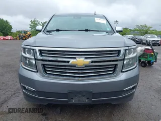 2019 Chevrolet Suburban Premier with VIN 1GNSKJKC9KR288722, listed as a IAAI auction lot 42282877 with 161,795 mi miles and . Bid and sale history available at DreamBid. Image 12.