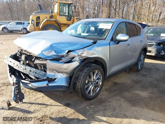 2021 Mazda CX-5 Grand Touring with VIN JM3KFADM7M1328341, listed as a IAAI auction lot 41660906 with 109,417 mi miles. Bid and sale history available at carsss.com. Image 2.