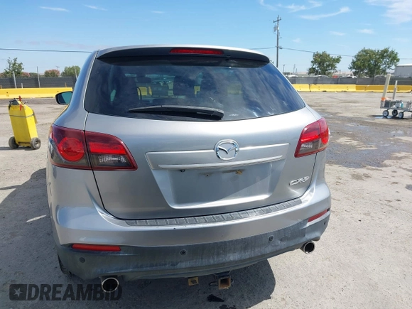 2014 Mazda CX-9 Grand Touring z VIN JM3TB2DVXE0432991, wystawiony jako IAAI lot #42826784 z przebiegiem 134 265 mil mil oraz . Historia ofert i sprzedaży dostępna na DreamBid. Obrazek 16.