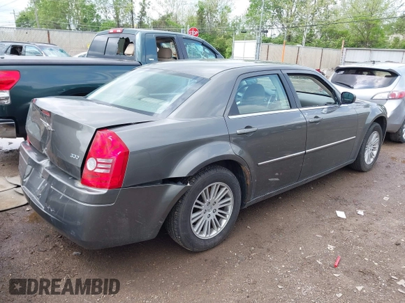 2009 Chrysler 300 LX with VIN 2C3KA43D49H558006, listed as a IAAI auction lot 42178195 with 208,864 mi miles and . Bid and sale history available at DreamBid. Image 4.