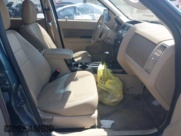 2011 Ford Escape Limited with VIN 1FMCU9EG1BKB19982, listed as a IAAI auction lot 42053239 with 247,669 mi miles. Bid and sale history available at carsss.com. Image 5.