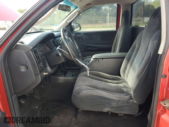 2002 Dodge Dakota z VIN 1B7FL36X72S543943, wystawiony jako Copart lot #80767984 z przebiegiem Nie podano mil oraz Czysty tytuł • Clean title. Historia ofert i sprzedaży dostępna na DreamBid. Obrazek 7.