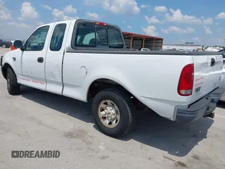 2003 Ford F-150 z VIN 2FTPX17L33CA59802, wystawiony jako IAAI lot #42669475 z przebiegiem 210 015 mil mil oraz . Historia ofert i sprzedaży dostępna na DreamBid. Obrazek 3.