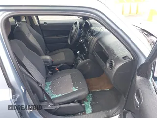 2013 Jeep Patriot Sport with VIN 1C4NJPBA6DD272701, listed as a IAAI auction lot 42014123 with 190,509 mi miles. Bid and sale history available at carsss.com. Image 5.