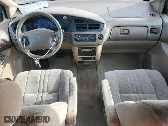 2001 Toyota Sienna LE with VIN 4T3ZF13C51U345619, listed as a Copart auction lot 71761094 with 165,000 mi miles and Salvage Title. Bid and sale history available at carsss.com. Image 8.