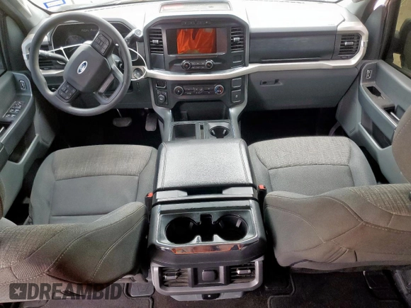 2021 Ford F-150 XL с VIN 1FTEW1EP0MFA25211, выставлен на аукционе Copart как лот 57992885 с пробегом Не указан миль и Списание • Salvage title. История ставок и продаж доступна на DreamBid. Изображение 8.