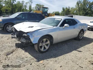 2021 Dodge Challenger SXT with VIN 2C3CDZAG6MH538662, listed as a Copart auction lot 69245164 with 76,227 mi miles and Salvage Title. Bid and sale history available at carsss.com. Image 1.