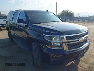 2015 Chevrolet Suburban LS with VIN 1GNSCHKC1FR590579, listed as a IAAI auction lot 42767484 with 241,709 mi miles and . Bid and sale history available at DreamBid. Image 1.