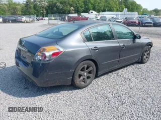 2009 Nissan Altima S z VIN 1N4AL21E99N496262, wystawiony jako IAAI lot #42408868 z przebiegiem 261 564 mil mil oraz . Historia ofert i sprzedaży dostępna na DreamBid. Obrazek 4.