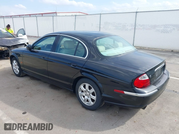 2003 Jaguar S-Type with VIN SAJEA01T93FM64497, listed as a IAAI auction lot 41804705 with 224,978 mi miles and . Bid and sale history available at DreamBid. Image 3.