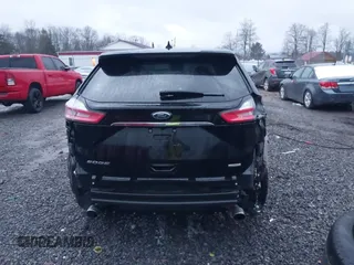 2020 Ford Edge SE z VIN 2FMPK3G95LBA06115, wystawiony jako IAAI lot #40884705 z przebiegiem 54 712 mil mil oraz . Historia ofert i sprzedaży dostępna na DreamBid. Obrazek 17.