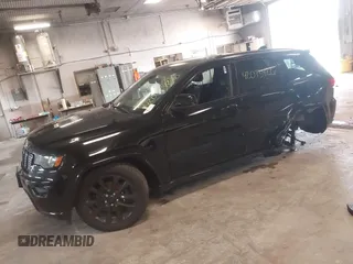 2018 Jeep Grand Cherokee Laredo E with VIN 1C4RJFAG4JC298393, listed as a IAAI auction lot 42073426 with 145,386 mi miles. Bid and sale history available at carsss.com. Image 16.