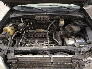 2006 Mercury Mariner Convenience with VIN 4M2YU56Z96KJ14418, listed as a Copart auction lot 47179135 with 163,557 mi miles and Salvage title. Bid and sale history available at DreamBid. Image 12.