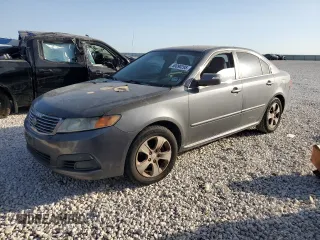 2009 Kia Optima LX z VIN KNAGE228X95361456, wystawiony jako Copart lot #50090295 z przebiegiem Nie podano mil oraz Szkoda całkowita • Salvage title. Historia ofert i sprzedaży dostępna na DreamBid. Obrazek 1.