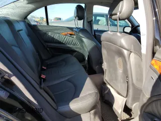 2004 Mercedes-Benz E-Class 5.0L with VIN WDBUF70J64A585084, listed as a Copart auction lot 80297124 with 233,638 mi miles and Salvage Title. Bid and sale history available at carsss.com. Image 10.