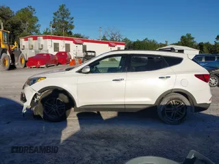 2017 Hyundai Santa Fe 2.4L z VIN 5XYZU3LB4HG435992, wystawiony jako IAAI lot #40927607 z przebiegiem 104 868 mil mil oraz . Historia ofert i sprzedaży dostępna na DreamBid. Obrazek 15.