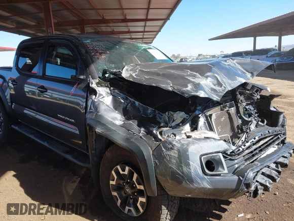 2017 Toyota Tacoma SR5 with VIN 3TMCZ5AN7HM104214, listed as a IAAI auction lot 41619808 with 48,236 mi miles and . Bid and sale history available at carsss.com. Image 1.