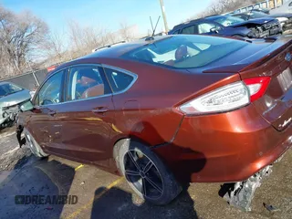 2016 Ford Fusion Titanium with VIN 3FA6P0K90GR244717, listed as a IAAI auction lot 41395806 with 151,853 mi miles. Bid and sale history available at carsss.com. Image 14.