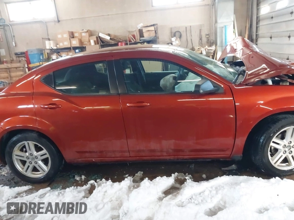 2012 Dodge Avenger SXT with VIN 1C3CDZCB0CN154559, listed as a IAAI auction lot 41618230 with 171,497 mi miles and . Bid and sale history available at DreamBid. Image 13.