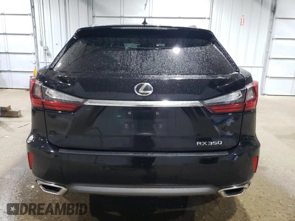 2016 Lexus RX 350 with VIN 2T2BZMCA2GC018943, listed as a Copart auction lot 66066174 with 79,668 mi miles and Salvage title. Bid and sale history available at DreamBid. Image 6.
