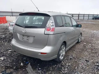 2007 Mazda 5 Touring with VIN JM1CR29L570139627, listed as a IAAI auction lot 41153270 with 90,228 mi miles and . Bid and sale history available at carsss.com. Image 4.