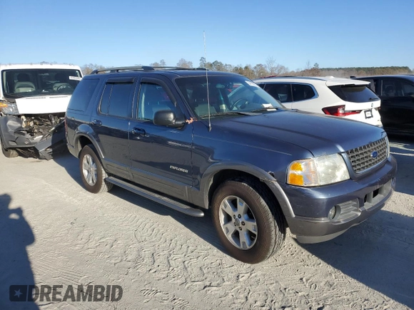 2002 Ford Explorer XLT with VIN 1FMZU63KX2UD18811, listed as a Copart auction lot 84105904 with 163,306 mi miles and Salvage Title. Bid and sale history available at DreamBid. Image 4.