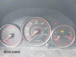 2005 Honda Civic Cpe LX with VIN 1HGEM22555L068087, listed as a IAAI auction lot 41553322 with 205,902 mi miles. Bid and sale history available at carsss.com. Image 7.