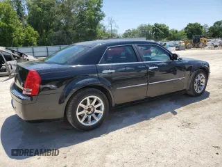 2008 Chrysler 300 C Hemi with VIN 2C3KA63H08H156142, listed as a Copart auction lot 53741595 with 216,677 mi miles and Salvage Title. Bid and sale history available at carsss.com. Image 3.