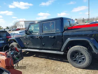 2021 Jeep Gladiator Mojave with VIN 1C6JJTEG9ML528964, listed as a IAAI auction lot 41879113 with 74,315 mi miles and . Bid and sale history available at DreamBid. Image 14.