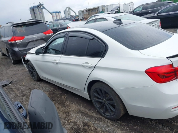 2018 BMW 3 Series 320i xDrive with VIN WBA8E5G52JNU46803, listed as a IAAI auction lot 41869625 with 67,057 mi miles. Bid and sale history available at carsss.com. Image 15.