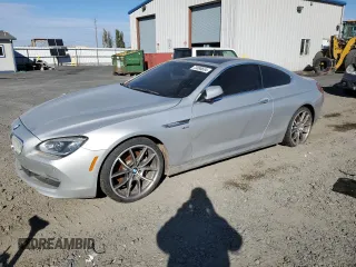 2012 BMW 6 Series 650i xDrive with VIN WBALX5C56CC893983, listed as a Copart auction lot 73890634 with 112,621 mi miles and Clean Title. Bid and sale history available at DreamBid. Image 1.