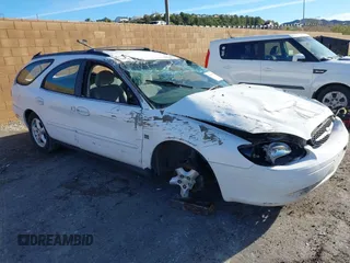 2002 Ford Taurus SE z VIN 1FAFP58S02G271973, wystawiony jako IAAI lot #41549762 z przebiegiem 139 165 mil mil oraz . Historia ofert i sprzedaży dostępna na DreamBid. Obrazek 1.