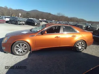 2008 Cadillac CTS AWD w/1SB with VIN 1G6DT57V980188992, listed as a IAAI auction lot 40945087 with 63,744 mi miles. Bid and sale history available at carsss.com. Image 14.