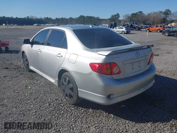 2009 Toyota Corolla with VIN 1NXBU40E29Z064526, listed as a IAAI auction lot 41790965 with 122,578 mi miles. Bid and sale history available at carsss.com. Image 3.