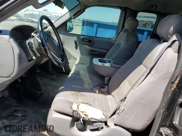 2003 Ford F-150 XL z VIN 2FTRX18W83CB15153, wystawiony jako Copart lot #52976575 z przebiegiem Nie podano mil oraz Szkoda całkowita • Salvage title. Historia ofert i sprzedaży dostępna na DreamBid. Obrazek 7.