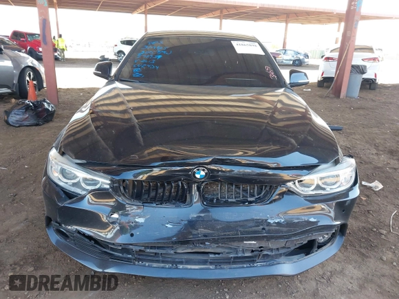 2015 BMW 4 Series 428i with VIN WBA3N3C55FK232613, listed as a IAAI auction lot 41865898 with 104,585 mi miles and . Bid and sale history available at carsss.com. Image 12.