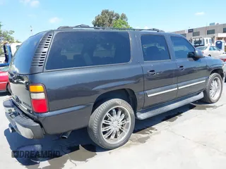 2005 Chevrolet Suburban Z71 with VIN 3GNFK16Z35G126718, listed as a IAAI auction lot 42084280 with 237,875 mi miles. Bid and sale history available at carsss.com. Image 4.