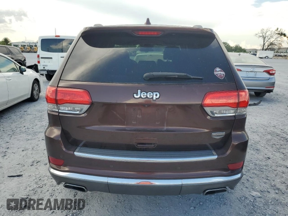 2014 Jeep Grand Cherokee Summit с VIN 1C4RJEJG4EC380074, выставлен на аукционе Copart как лот 64123175 с пробегом 237 803 миль миль и Списание • Salvage title. История ставок и продаж доступна на DreamBid. Изображение 6.