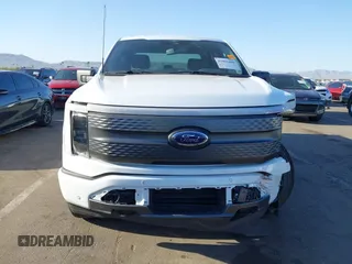 2023 Ford F-150 Lightning Pro with VIN 1FTVW1EL4PWG42578, listed as a IAAI auction lot 41992446 with 26,729 mi miles and . Bid and sale history available at DreamBid. Image 12.