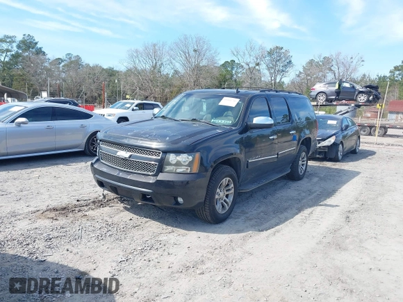 2013 Chevrolet Suburban LT with VIN 1GNSCJE07DR147780, listed as a IAAI auction lot 41666746 with 260,020 mi miles and . Bid and sale history available at DreamBid. Image 2.