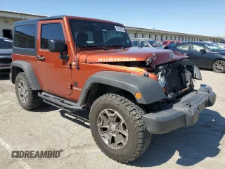 2014 Jeep Wrangler Rubicon with VIN 1C4BJWCG9EL285532, listed as a Copart auction lot 56548325 with 100,032 mi miles and Salvage title. Bid and sale history available at DreamBid. Image 4.